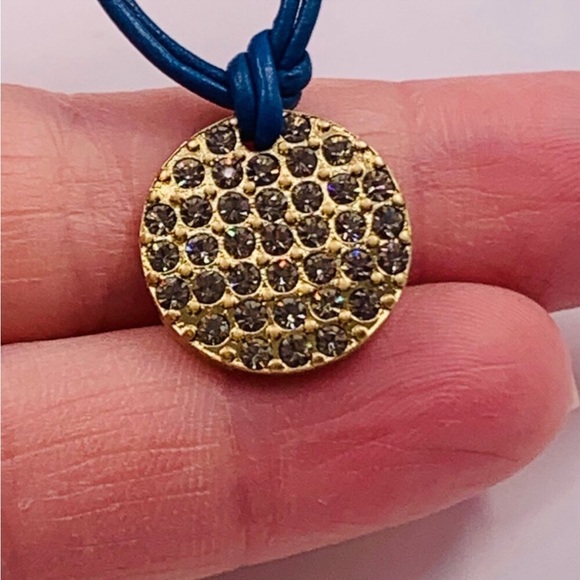 Lia Sophia Spotlight Crystal
Pave Coin Gold Tone Pendant Blue
Cord Necklace - Picture 2 of 6